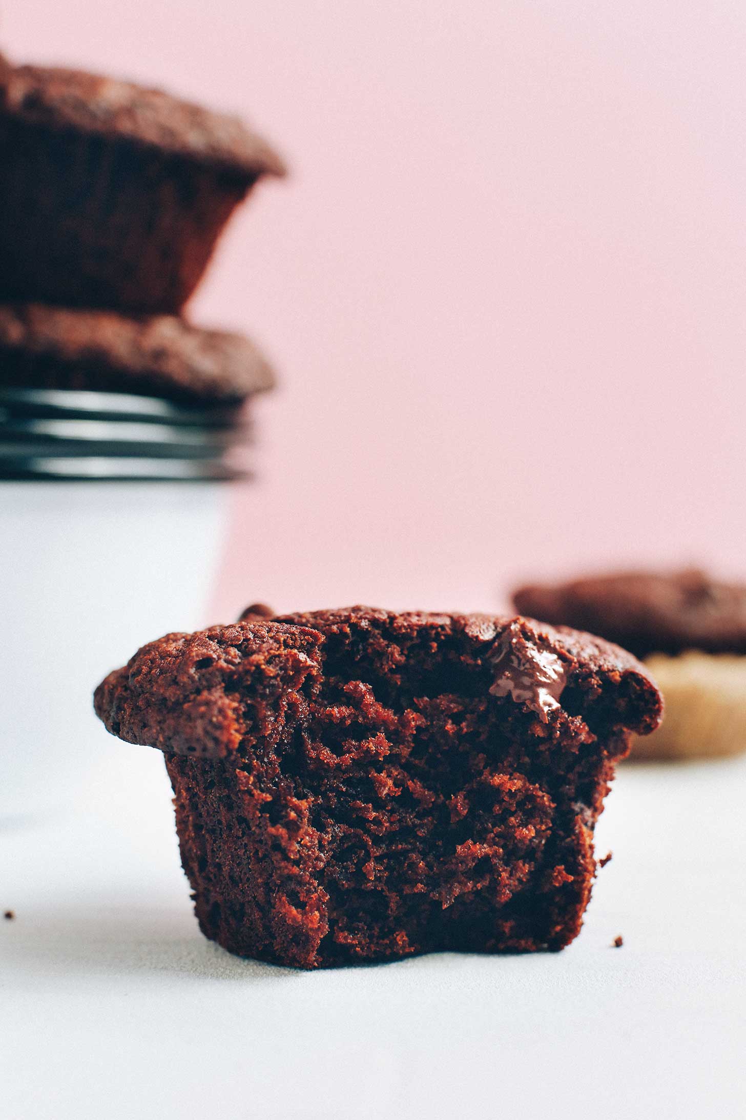 Half eaten delicious vegan chocolate muffin