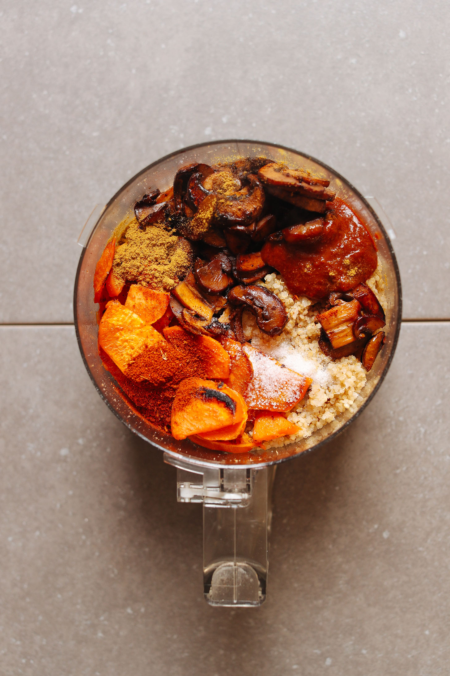 All the ingredients in the food processor ready to become amazing BBQ Black Bean Burgers