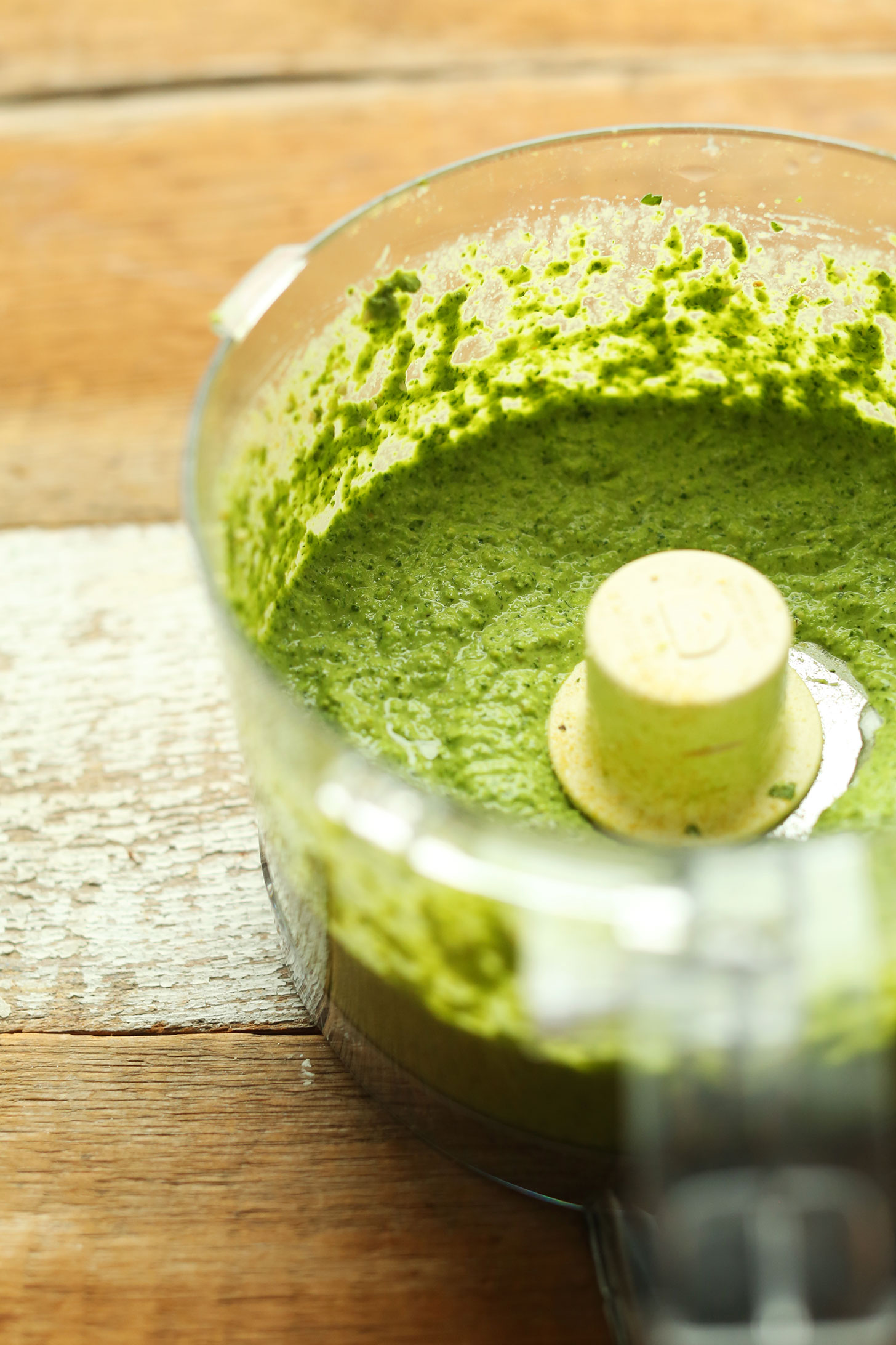 Food processor with freshly blended vegan Pea Pesto