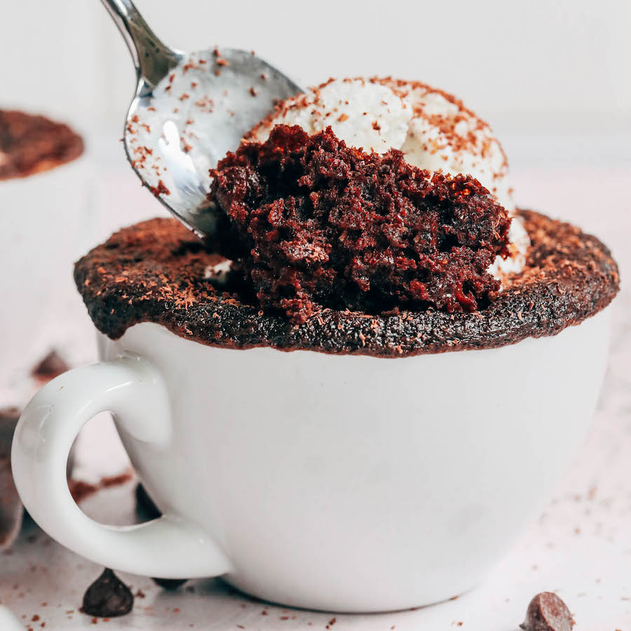 Spoon scooping into a gluten-free chocolate mug cake
