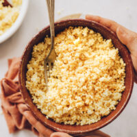 Fork in a bowl of cooked pearl millet