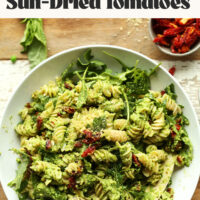 Image of pea pesto pasta with sun-dried tomatoes