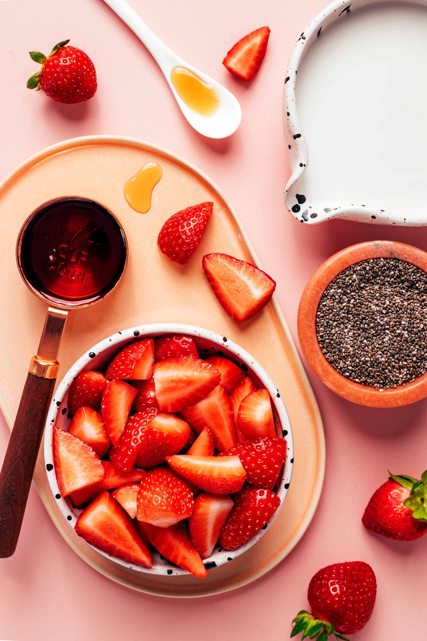 Fresh strawberries, chia seeds, coconut milk, vanilla, and maple syrup