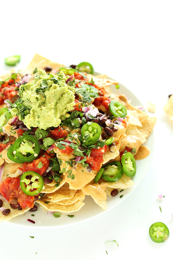 Plate piled high with the Best Damn Vegan Nachos