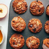 Vegan gluten-free morning glory muffins in a muffin tin